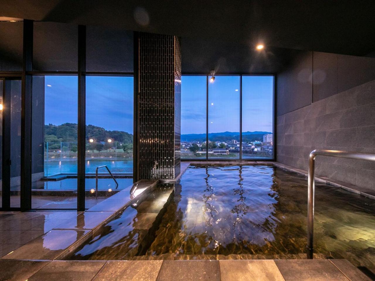 Отель Hitoyoshi Onsen Nabeya Экстерьер фото
